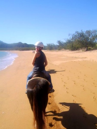 Horse riding along the beach in Magnetic Island, Australia